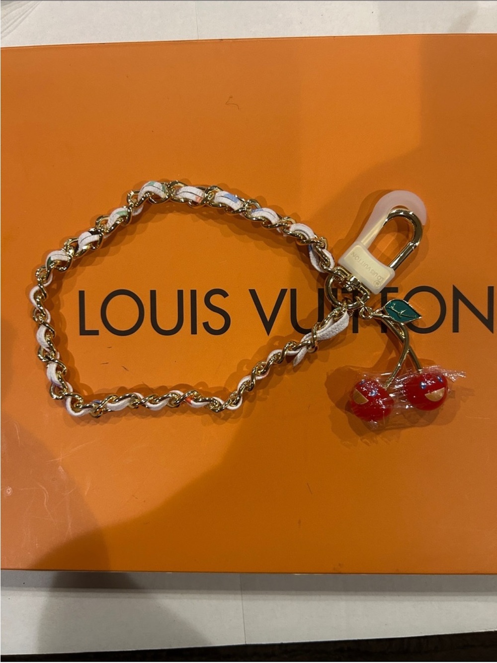 Unbranded Lo White and Gold Chain Charm Bracelet with Red Cherry Pendant